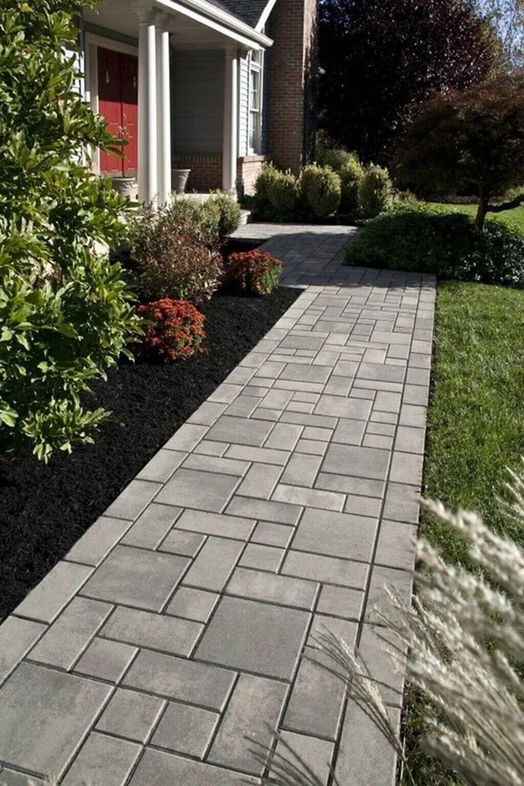 Paver walkway with masonry border