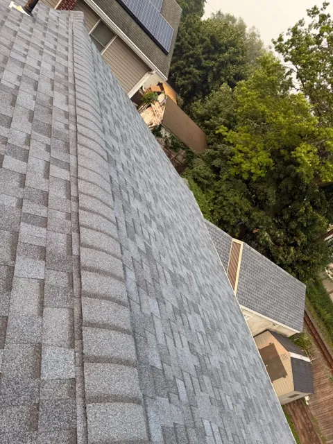 Architectural shingle roof viewed along the slope