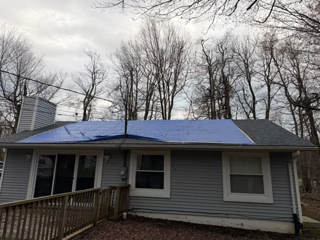 Cottage roof underlayment during roofing work