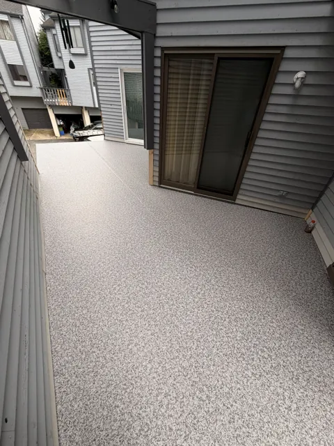 Textured gray floor on a covered porch