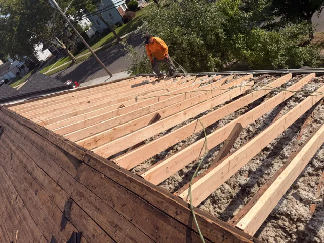 Exposed roof rafters during reframing work