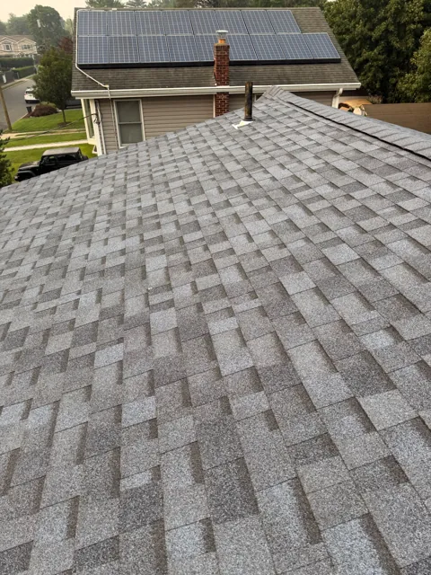 Completed gray architectural shingle roof