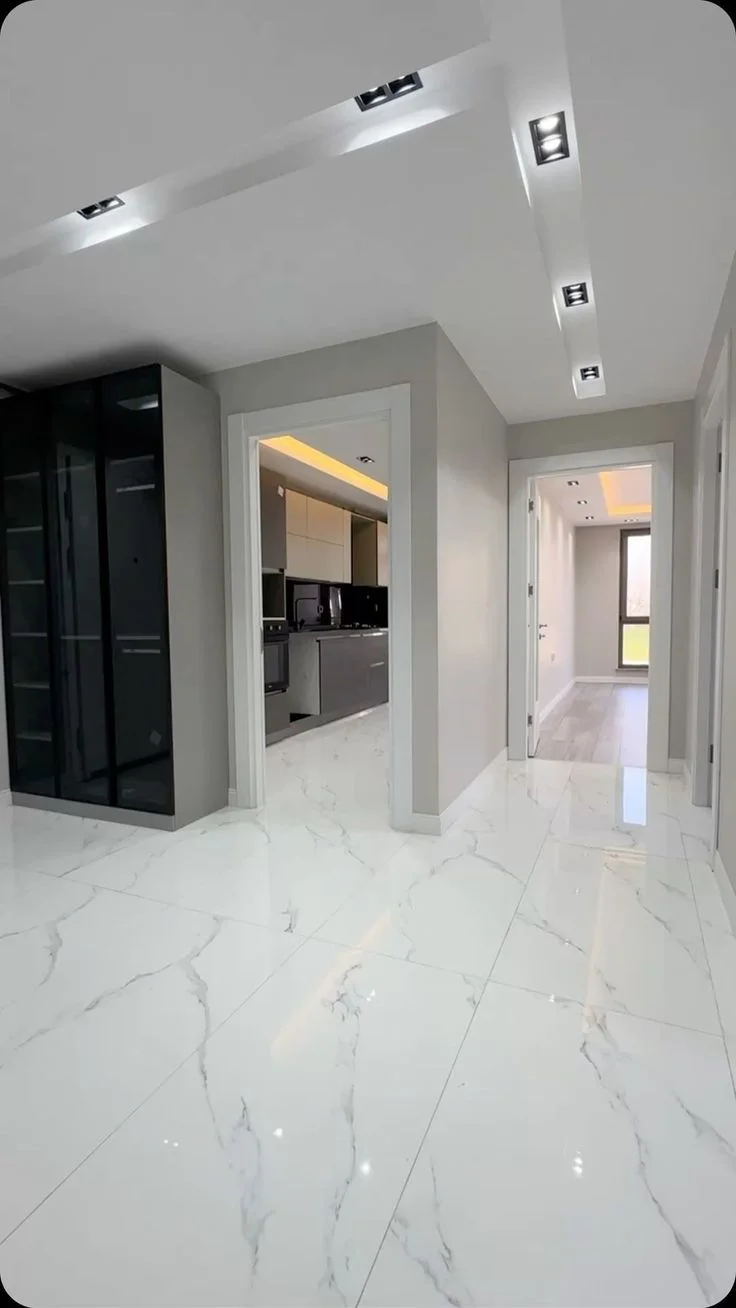 Polished marble tile hallway